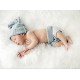 Konrad Bak: Baby sleeping in Feathers